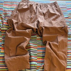 Nike Men’s camel brown pants size large loose fit cheaper leg new tags